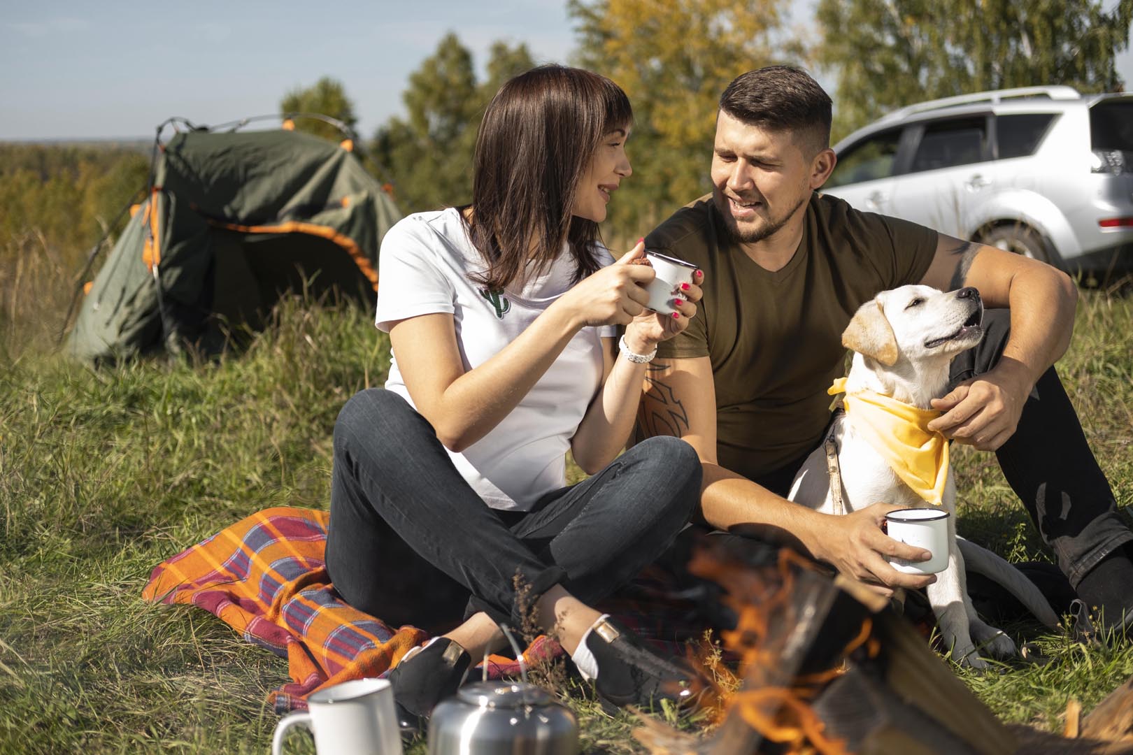 Long view cute couple dog spending time outdoors